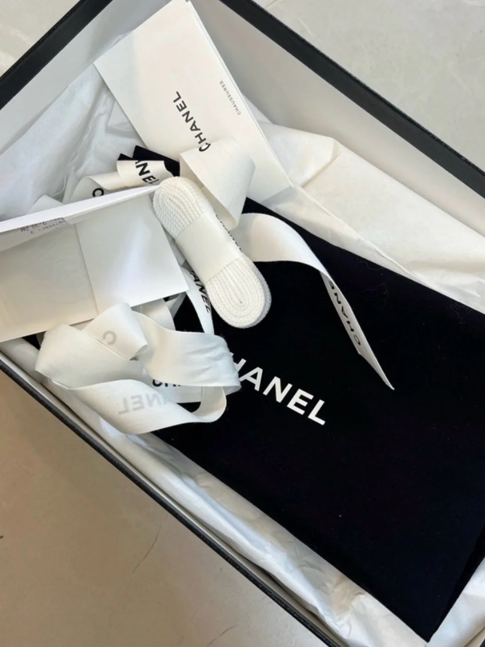 CHANEL Pink and White Low-Top Sneakers with Interlocking CC